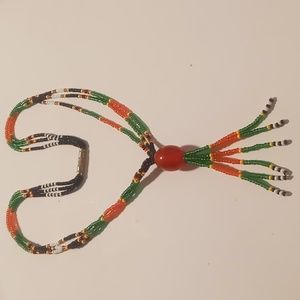 Vintage Seed bead necklace 16 inches long. Africa heritage colors